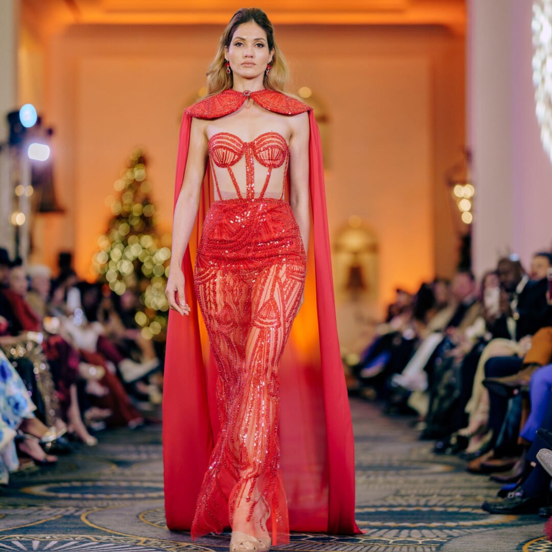 Romantic Aphrodite-inspired couture gown with luminous textures and delicate details.