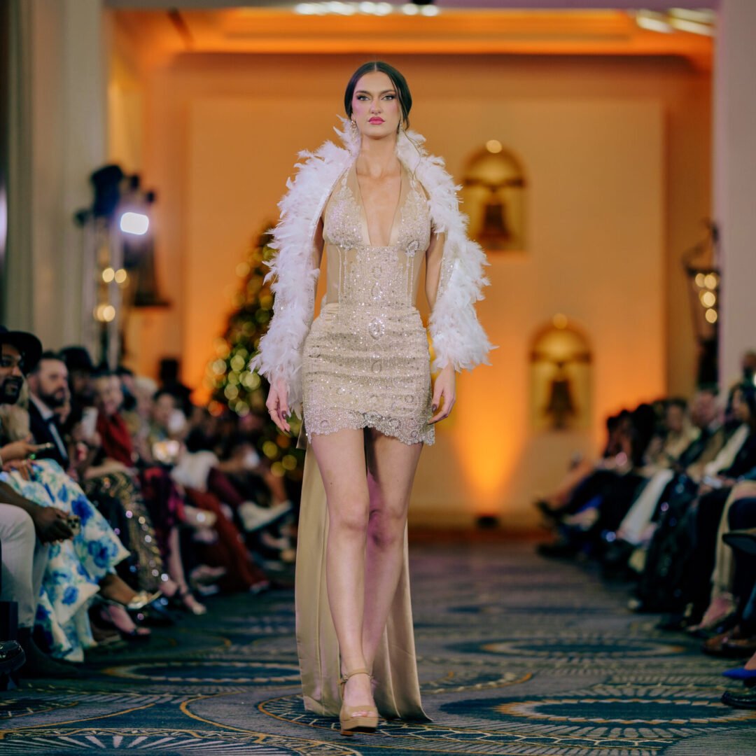 Dazzling Freya haute couture short dress covered in rhinestones and brilliant sparkle.