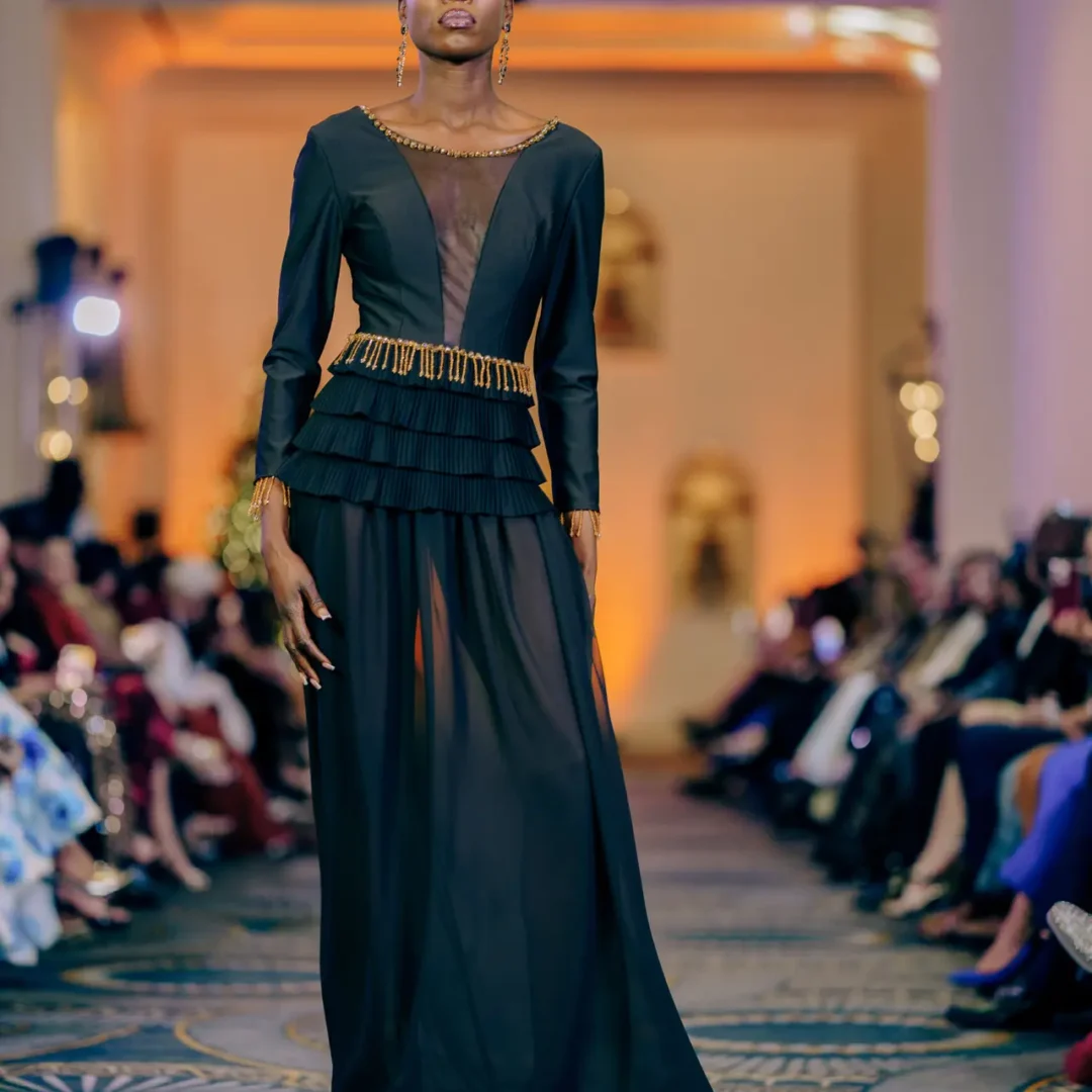 Majestic Isis haute couture long black gown with intricate golden details