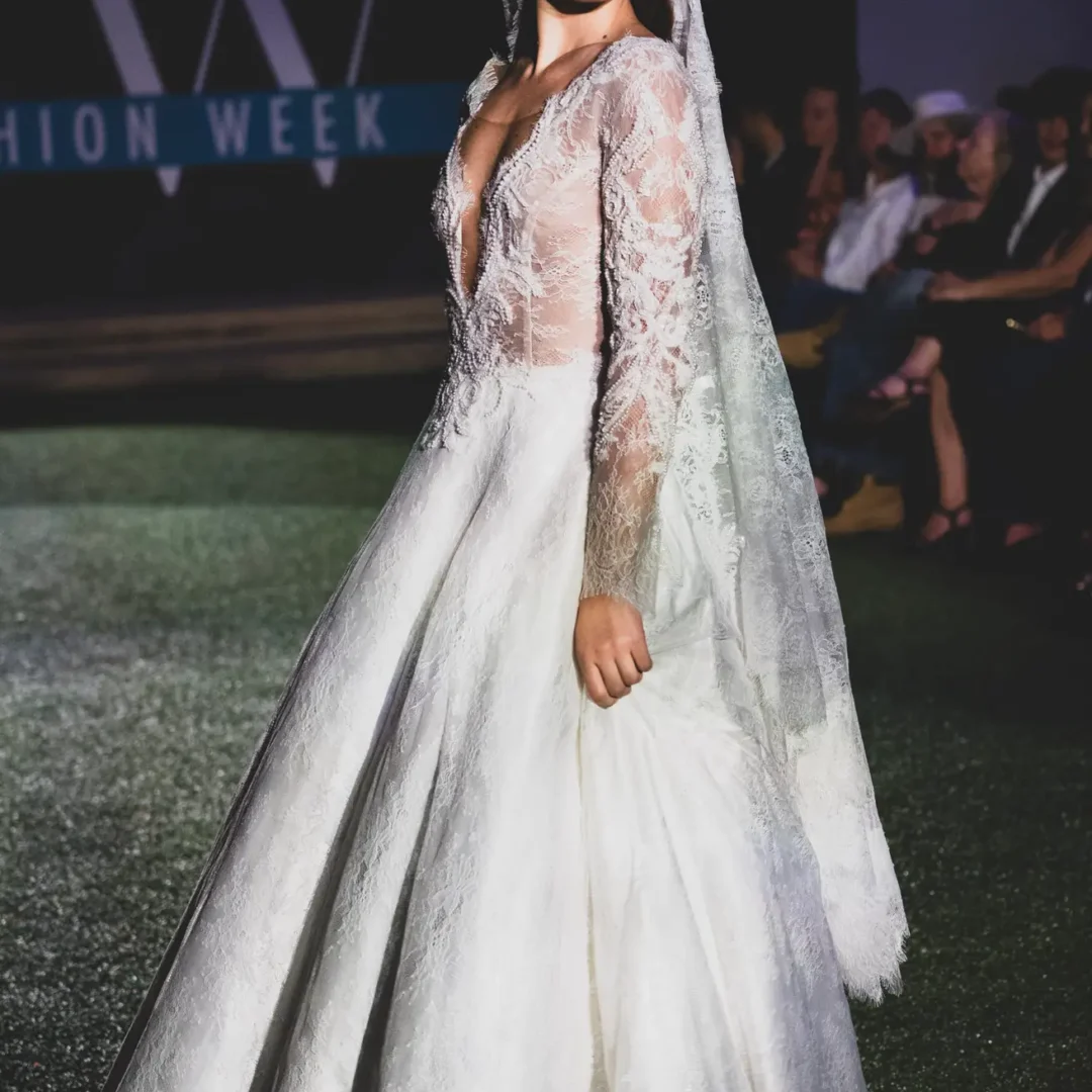 Sacred Virgen de Guadalupe bridal haute couture gown with flowing veil and intricate spiritual details